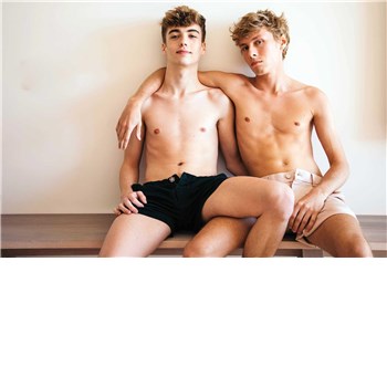 two topless males posing caressing