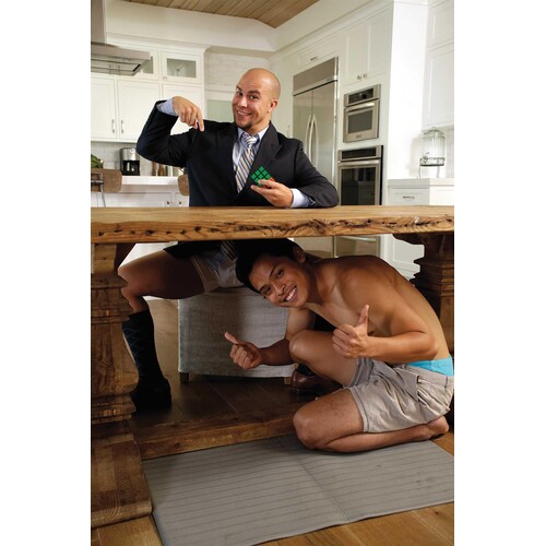 male under table with seated male