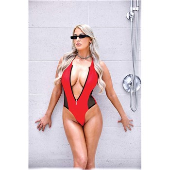 Blonde female posed wearing swimsuit revealing cleavage