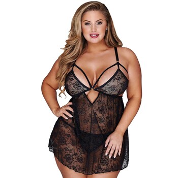Blonde female posed wearing lingerie displaying breasts