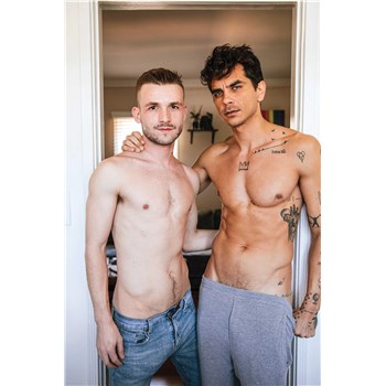 Two topless males posed  wearing jeans caressing
