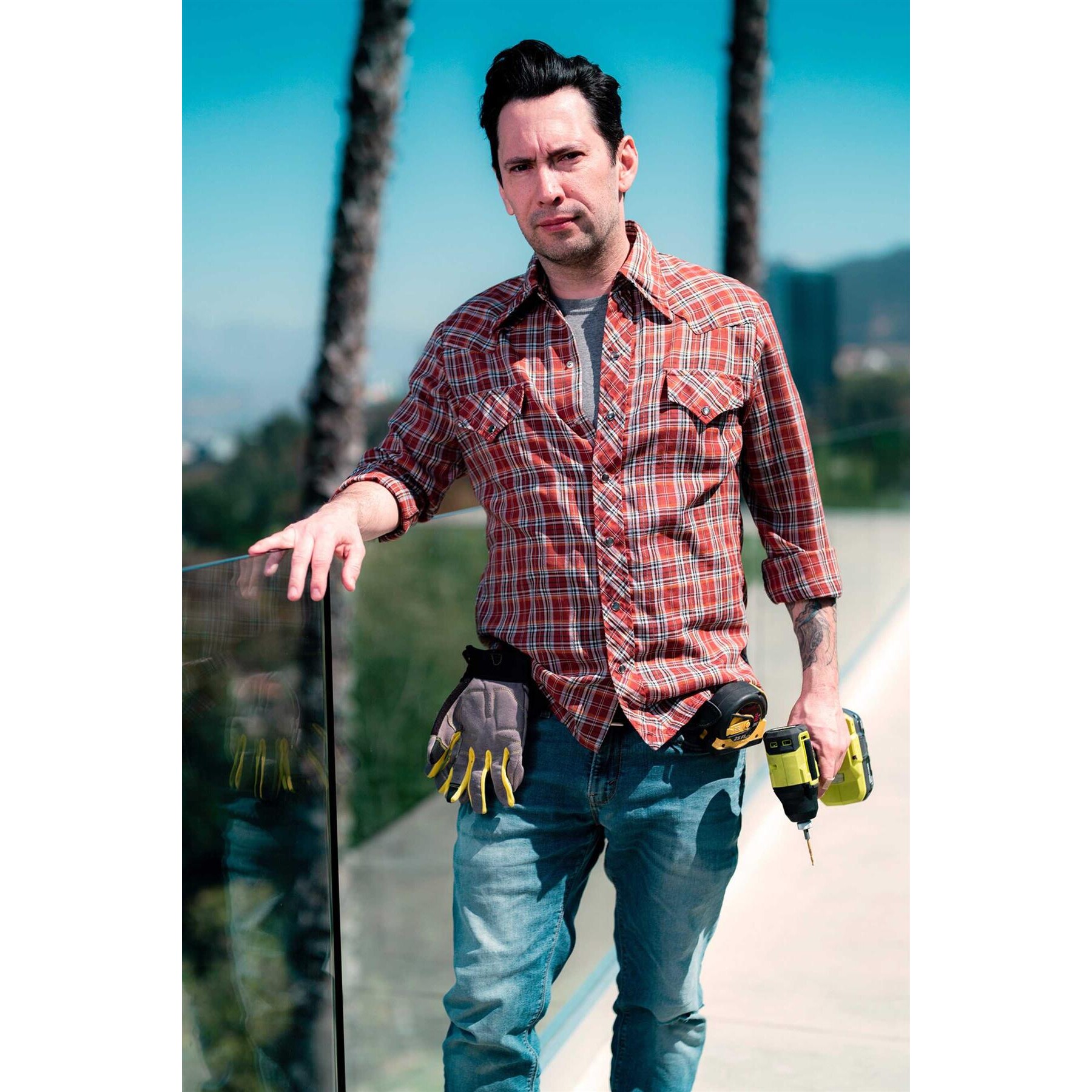 Clothed male posed outdoors