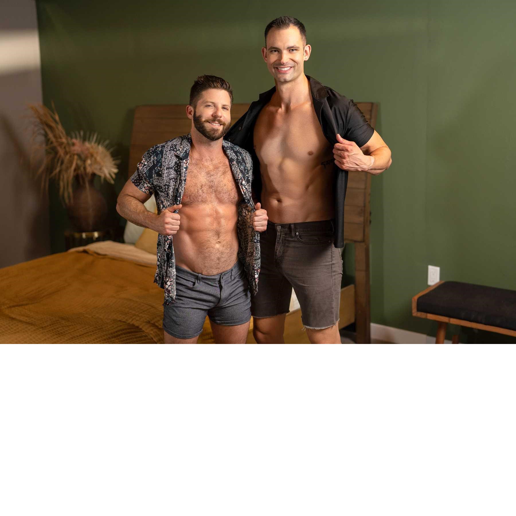 Two males posed revealing chests