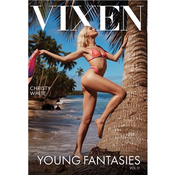 Blonde female posed wearing bikini outdoors against tree
vixen