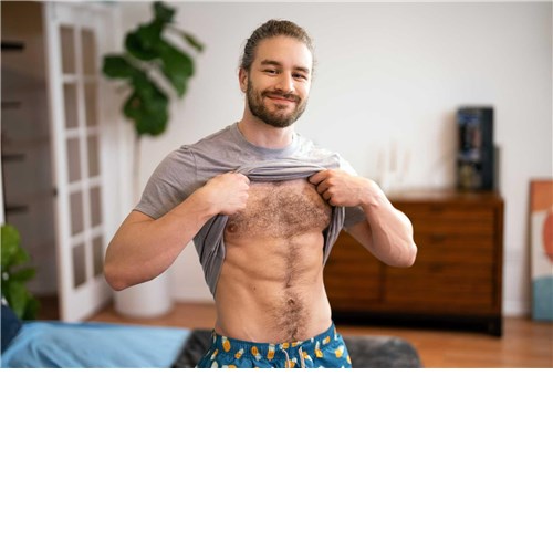 Male posed topless displaying chest