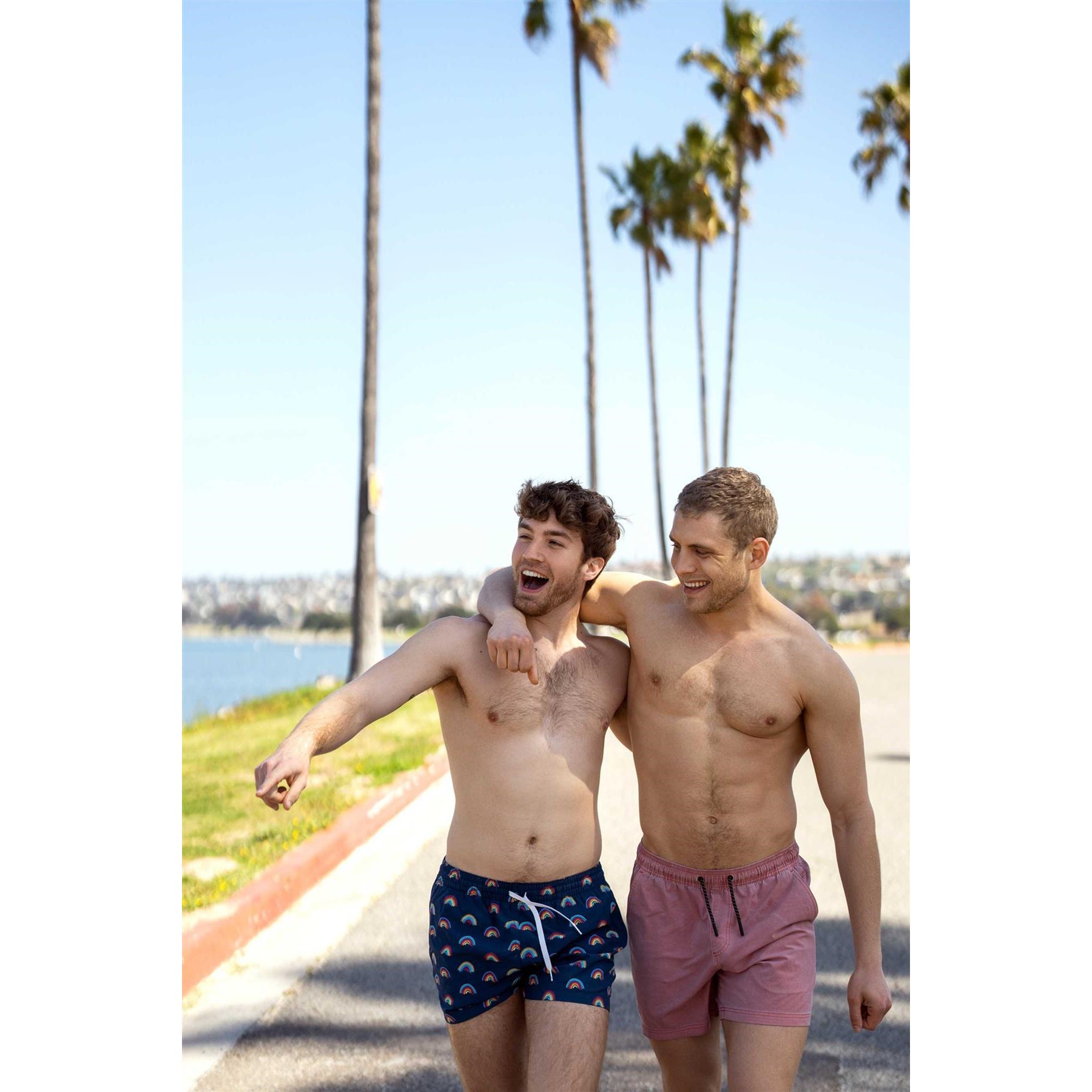 2 Males posed topless displaying chest